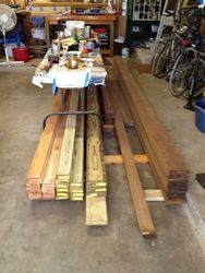 ../images/deck-furniture-2/stacked-lumber-phase-2.188x250.jpg